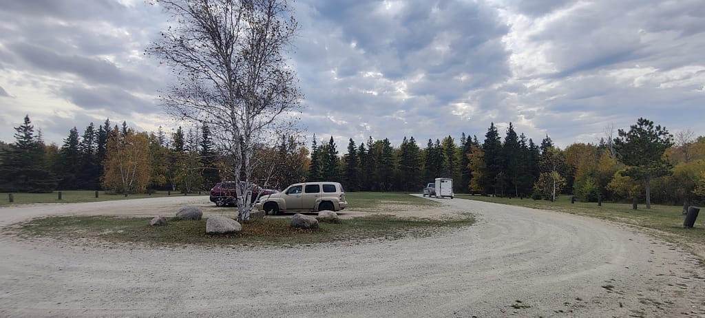Gravel parking lot at the picnic area of Zippel Bay State Park