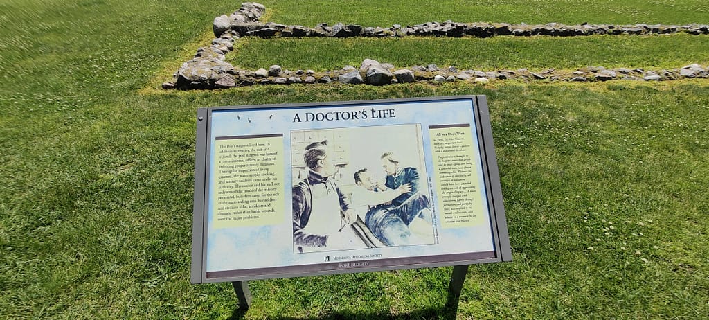 Stone outline and sign indicating the doctor's quarters at Fort Ridgely in Fort Ridgely State Park in Fairfax, MN
