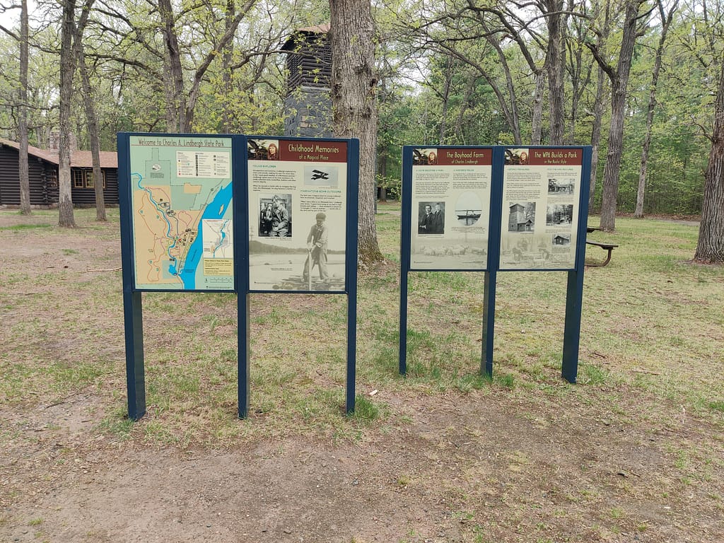 Map and informational signs at Charles A. Lindbergh State Park in Little Falls, MN