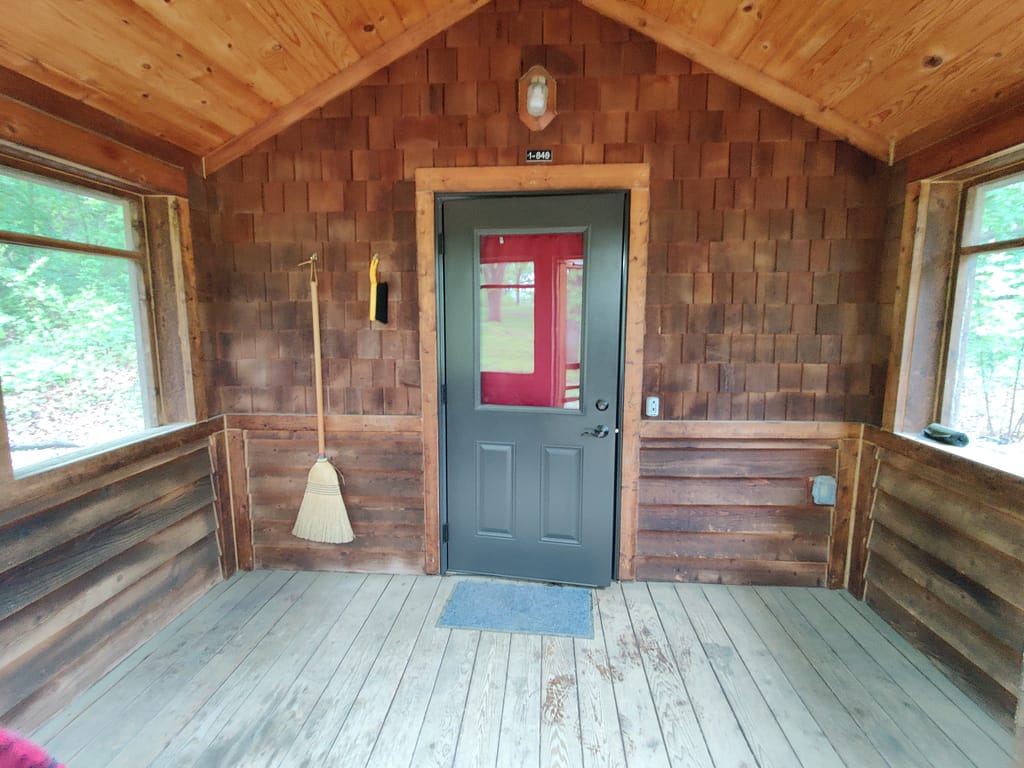 Door inside the screened area of Esker cabin at Glacial Lakes State Park in Starbuck, MN