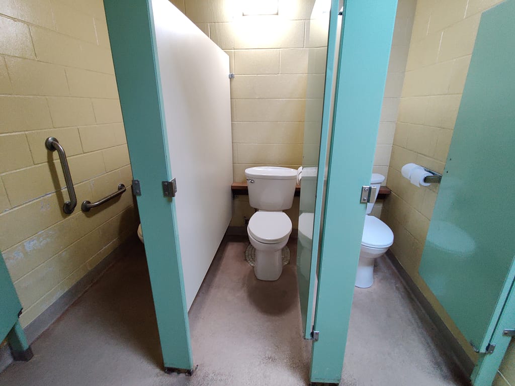 Toilet stalls in the modern bathroom at Glacial Lakes State Park in Starbuck, MN