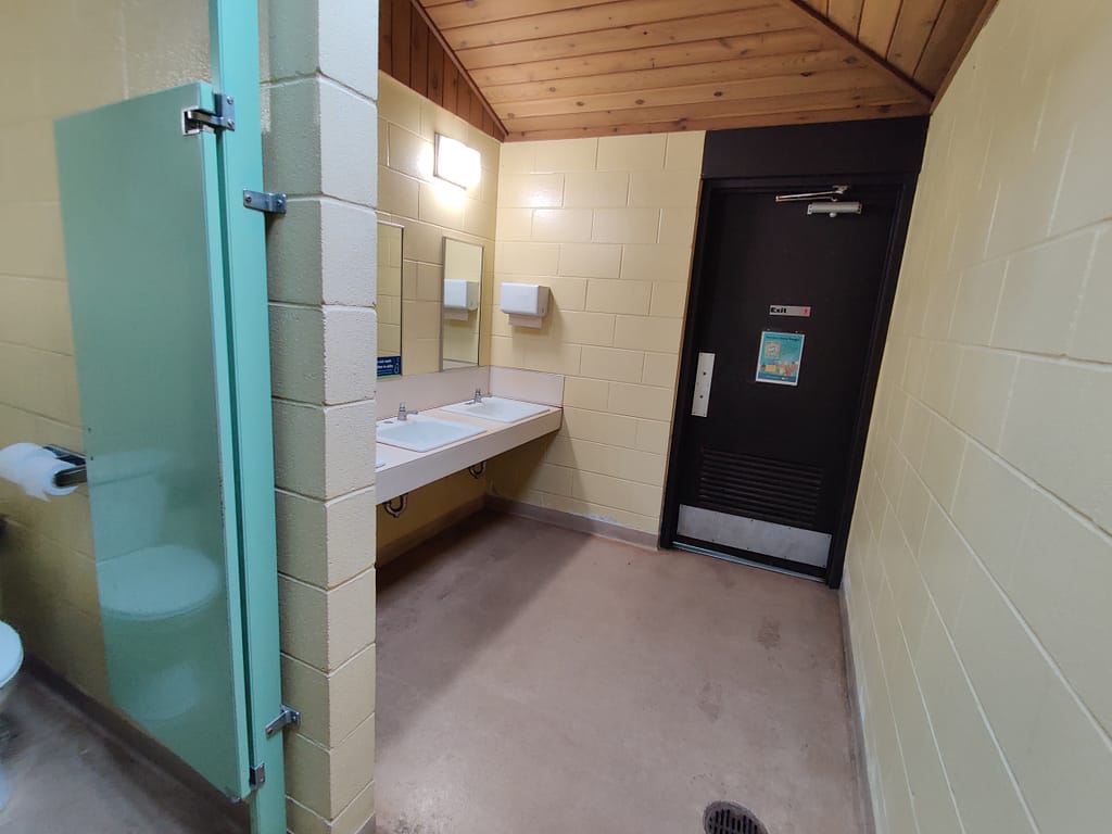 Sink and door in the modern bathroom at Glacial Lakes State Park in Starbuck, MN