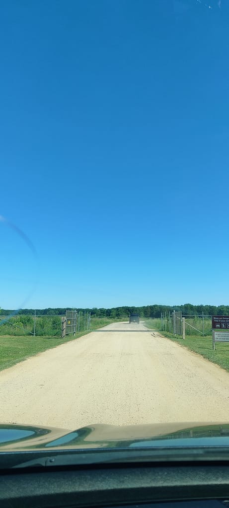 Gate and gravel road of the bison drive at Minneopa State Park in Mankato, MN