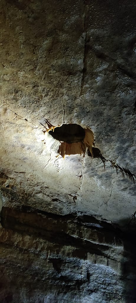 Hole in the ceiling of the cave. 
