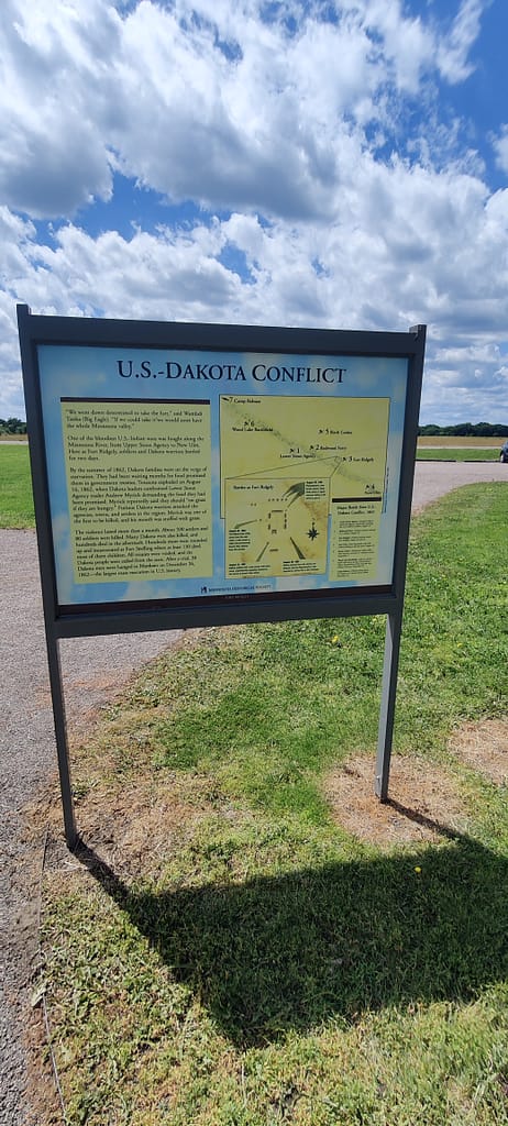 Informational sign about the US Dakota conflict at Fort Ridgely in Fort Ridgely State Park in Fairfax, MN