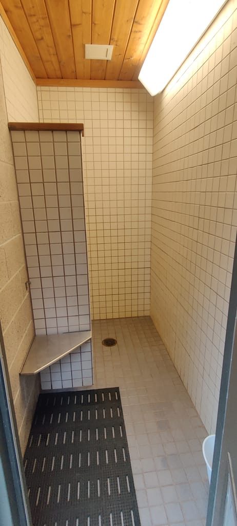 Shower stall in the bathroom building at the campground. 