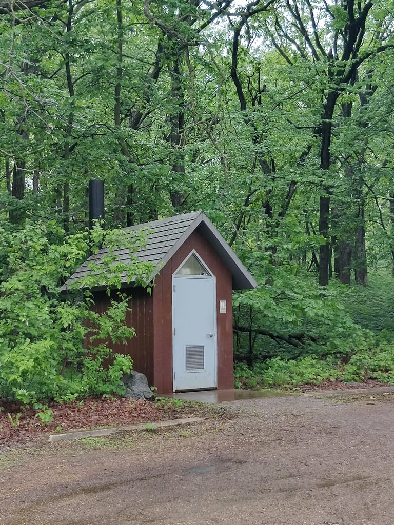 Vault toilet near Esker cabin at Glacial Lakes State Park in Starbuck, MN