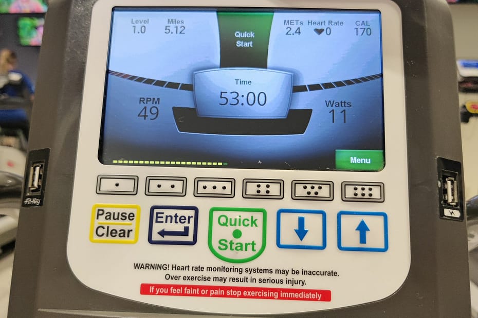 Monitor showing Seleana's work on the recumbent bike